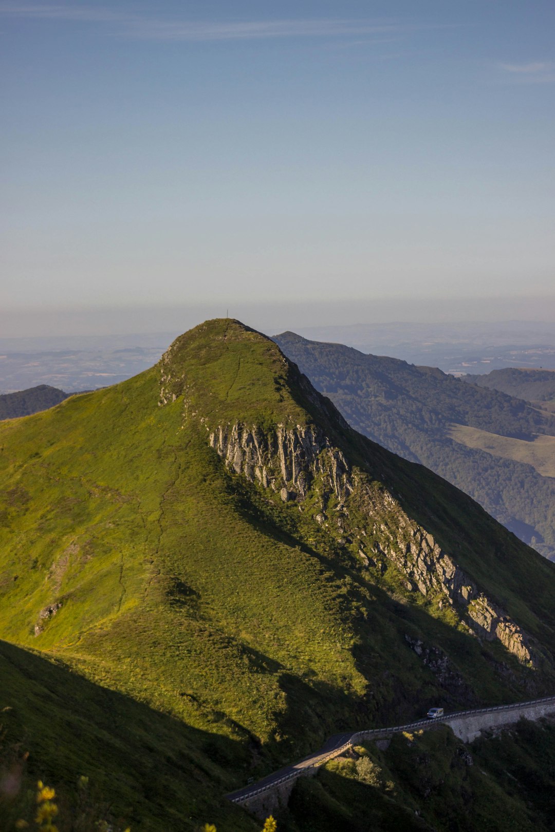 green and brown mountain under white sky during daytime