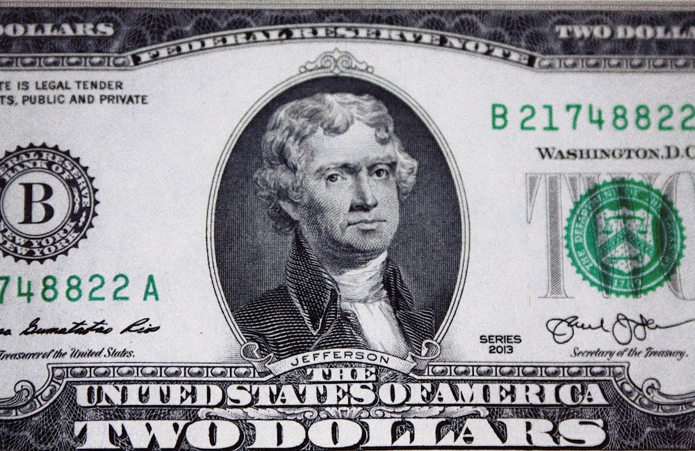 nota de dólar dos EUA no têxtil preto e branco