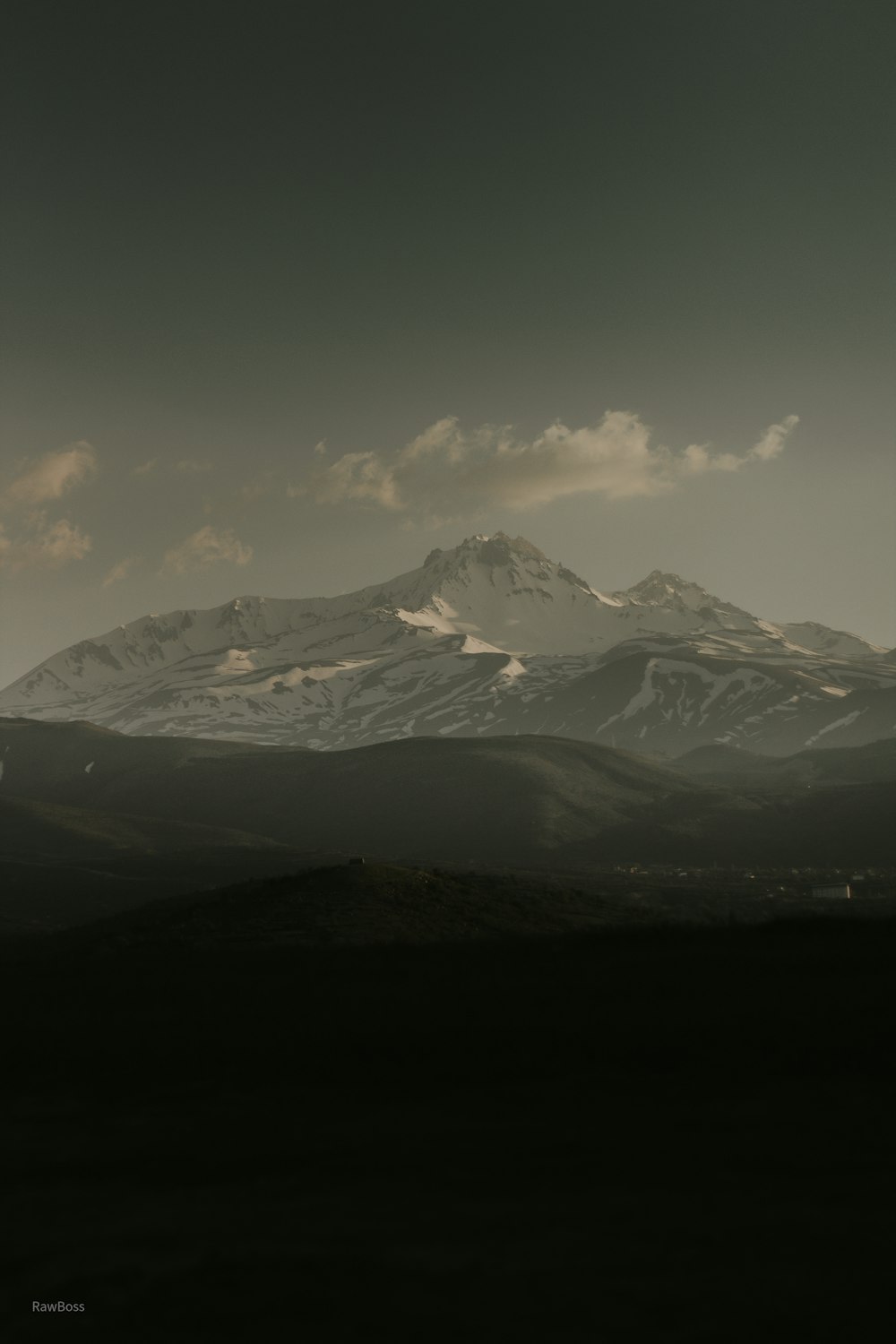 snow covered mountain under blue sky during daytime