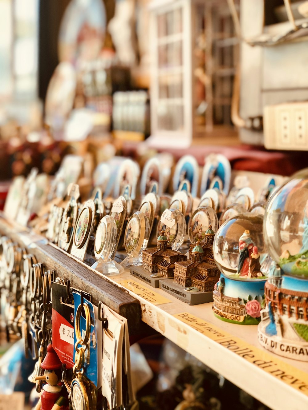 assorted chocolate bars on brown wooden shelf