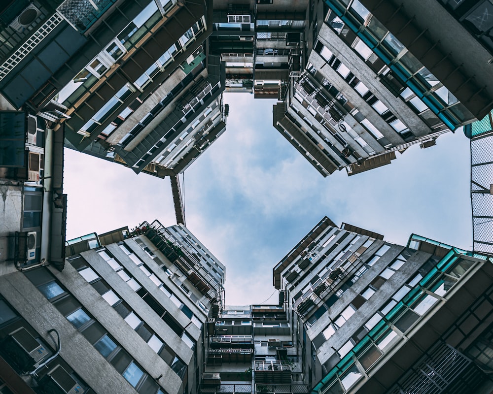 low angle photography of high rise buildings