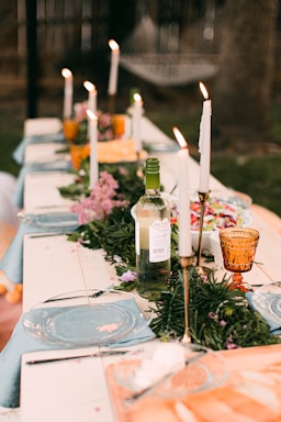 two glass bottles on white table