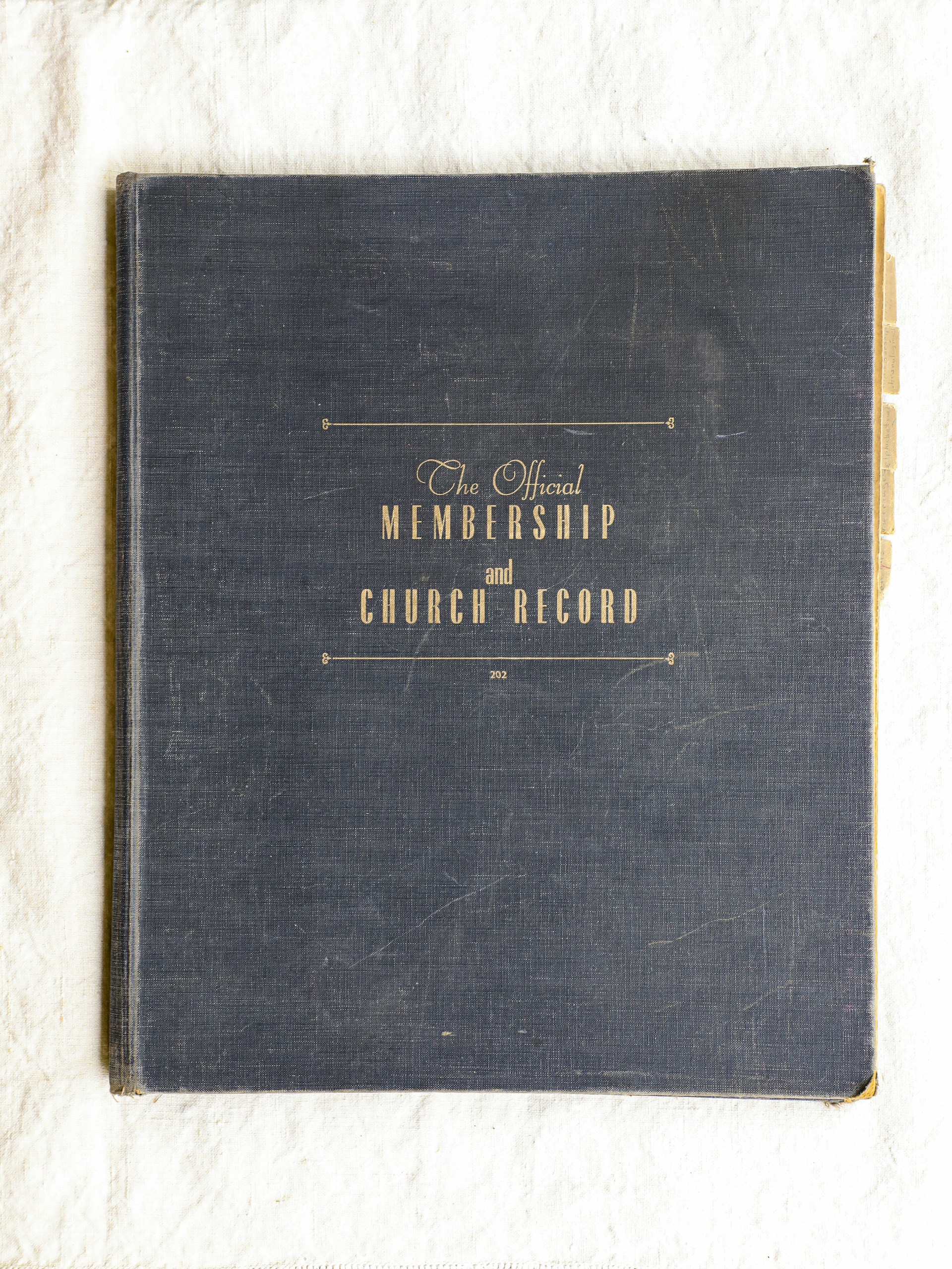 a black book with gold lettering on it