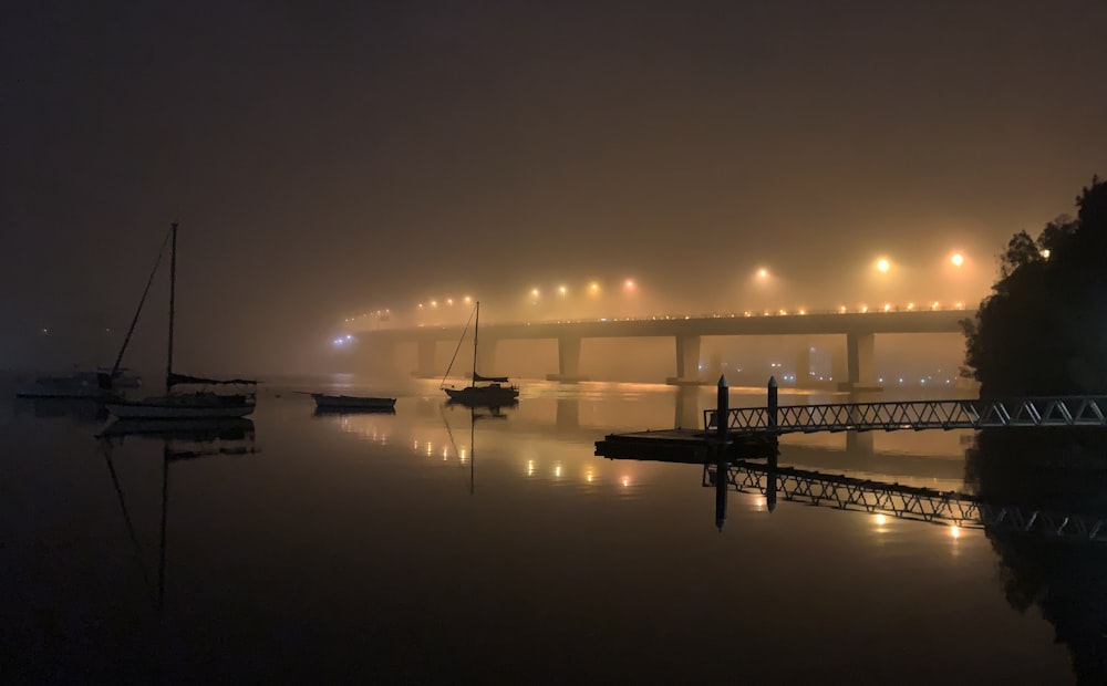 boat on water during night time