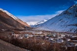 Scenic view of Tabo village in Spiti Valley, Himachal Pradesh, surrounded by rugged Himalayan peaks