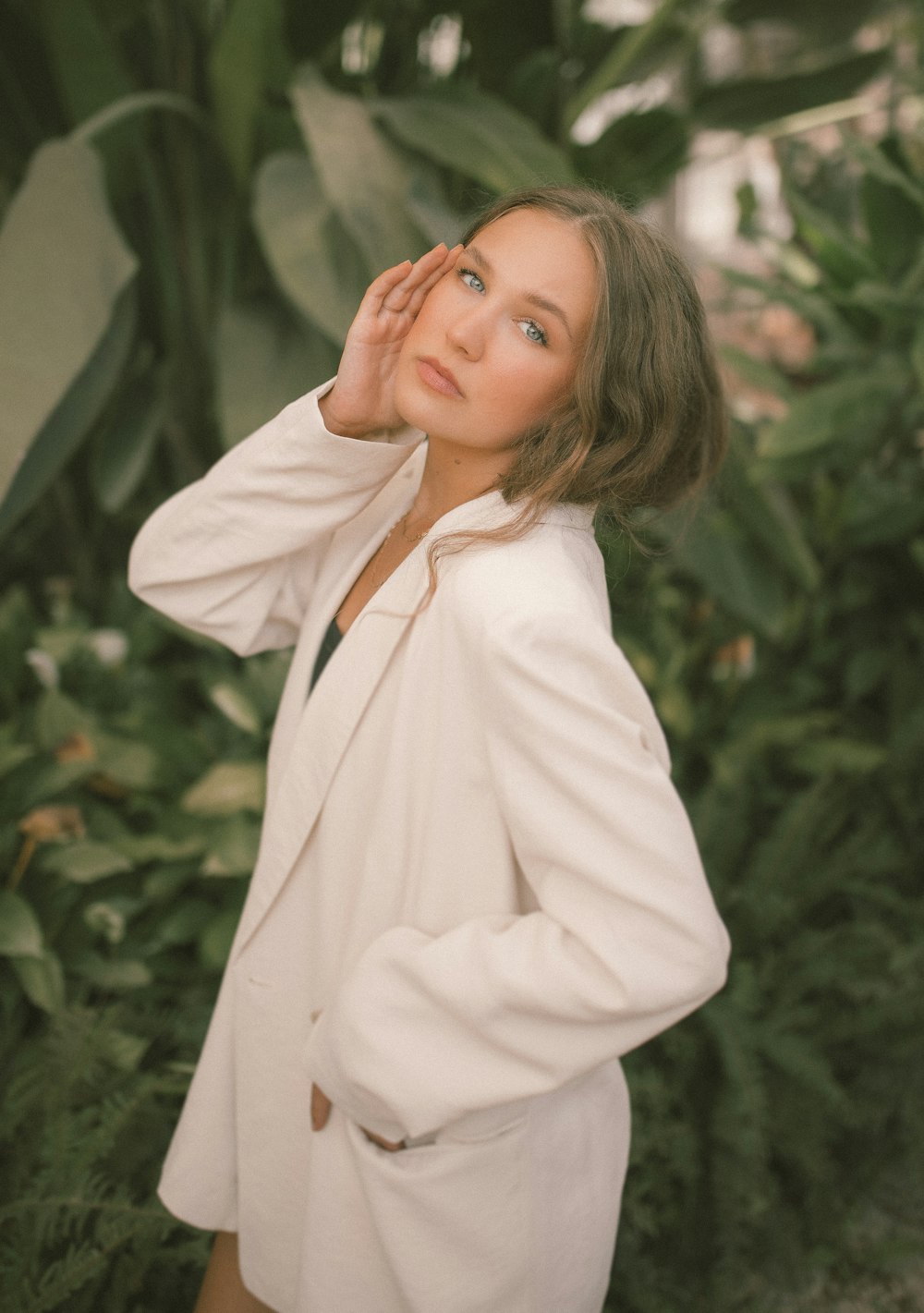 woman in white long sleeve shirt