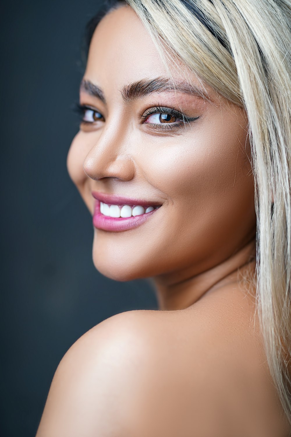 woman with brown hair smiling