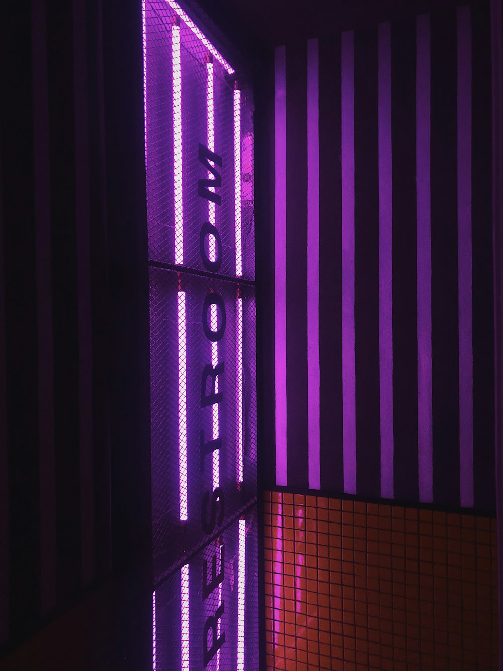 purple and black lighted wall