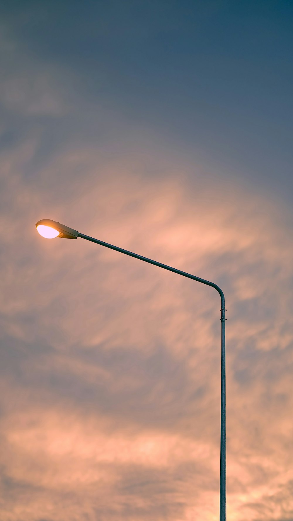 yellow and white street light under blue sky during daytime