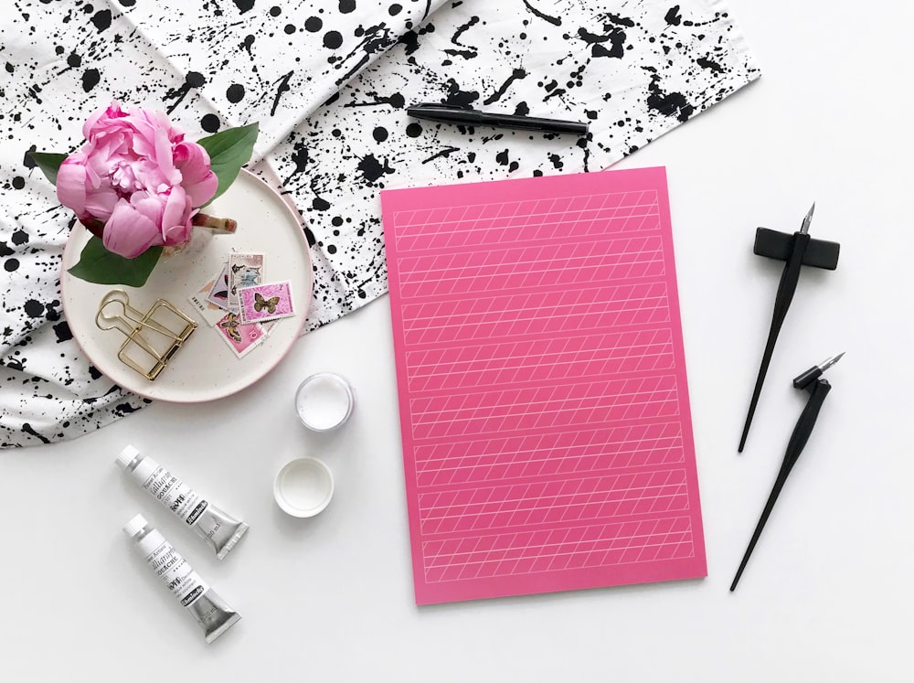 pink paper on white table