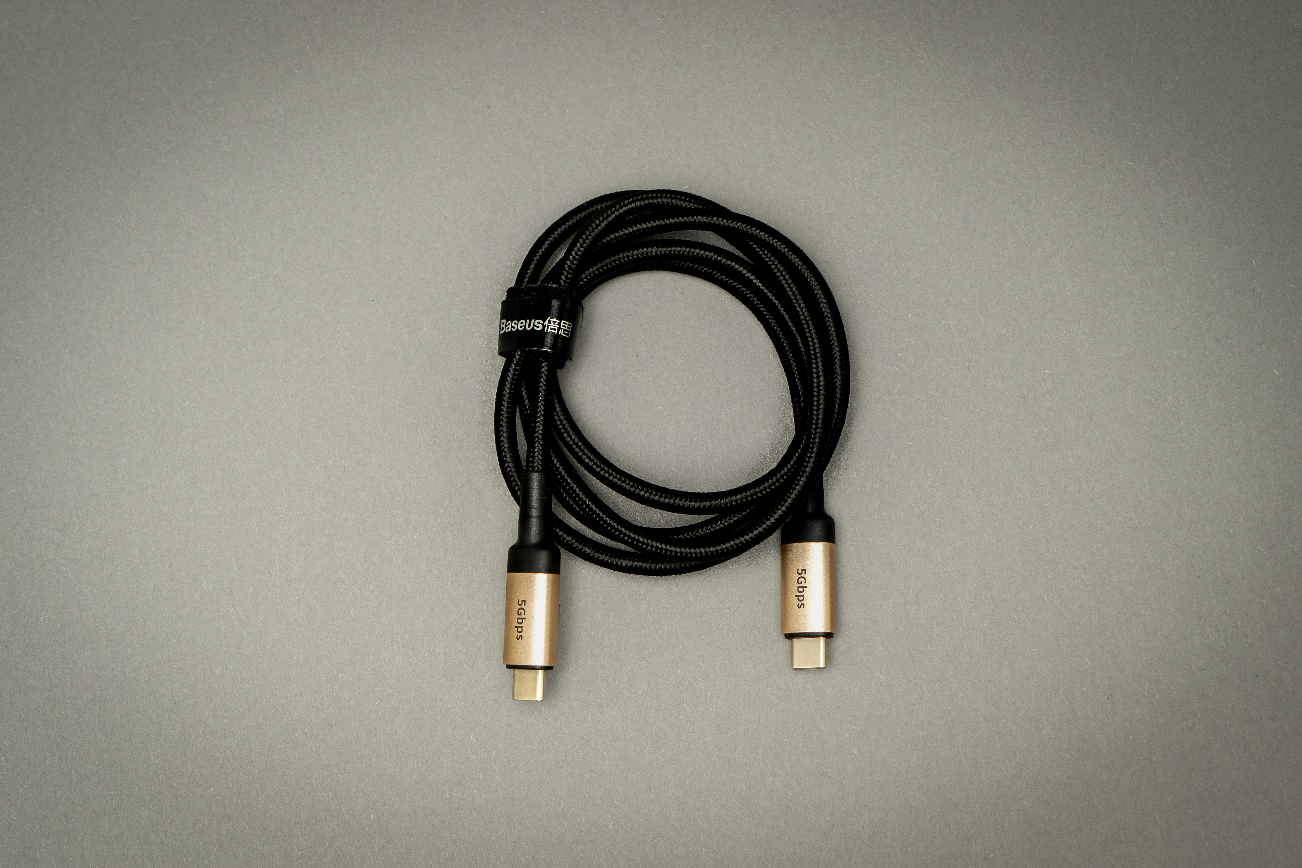 A one meter USB-C cable by Baseus. It has data lines and can carry display signals as well as USB, sound, etc.