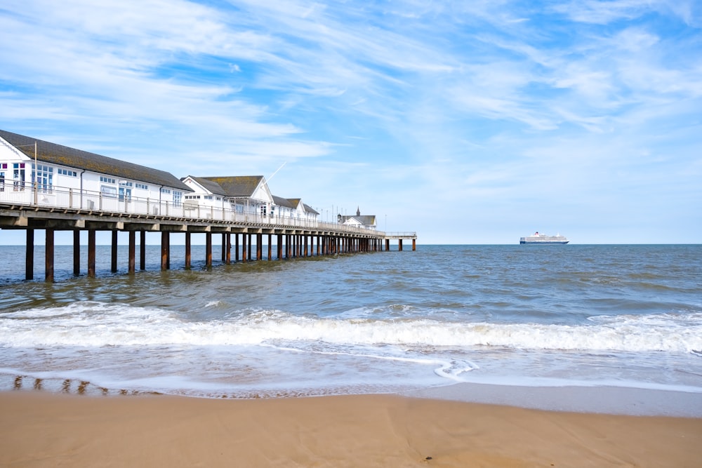 white wooden dock on sea during daytime