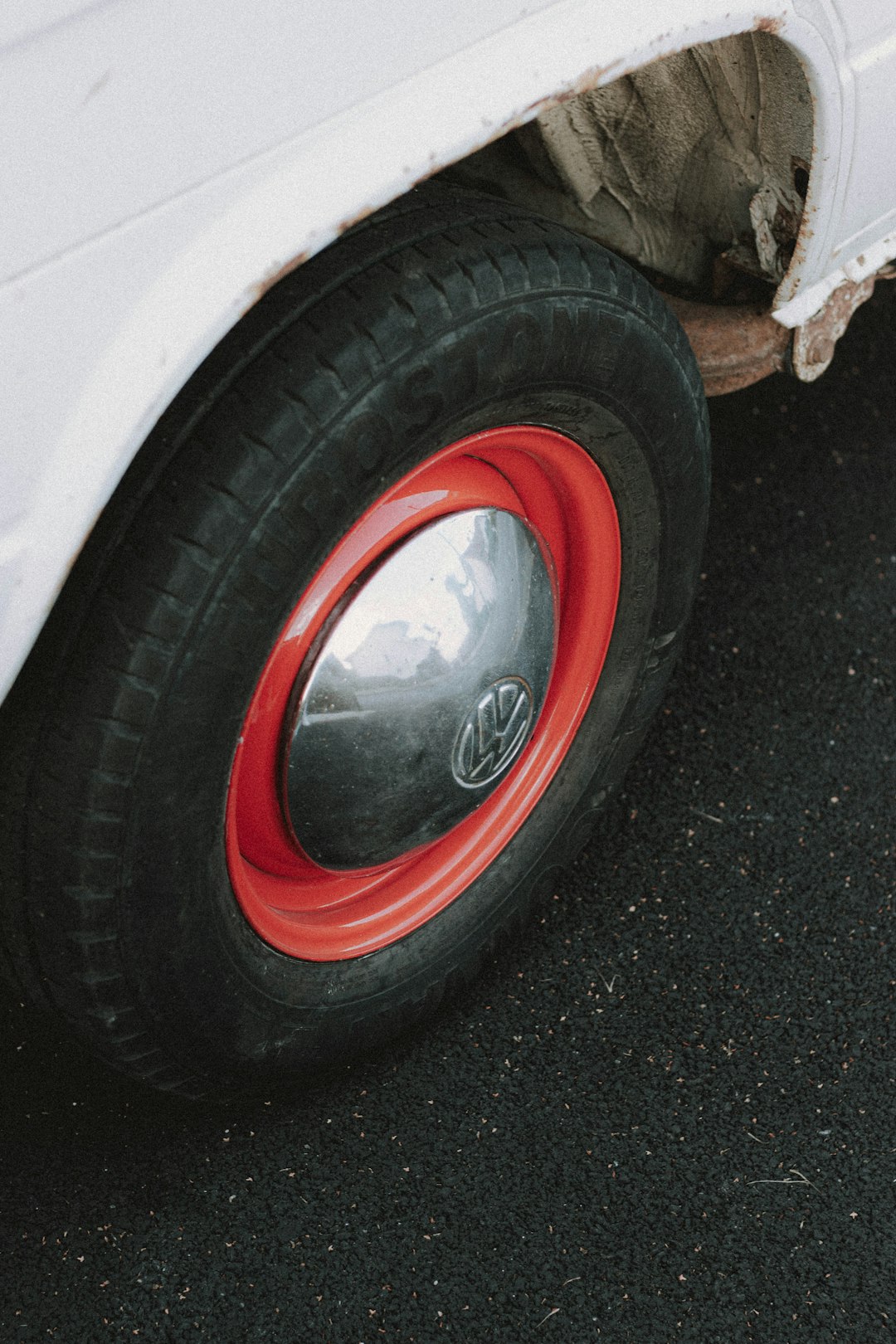 red and white car on black asphalt road