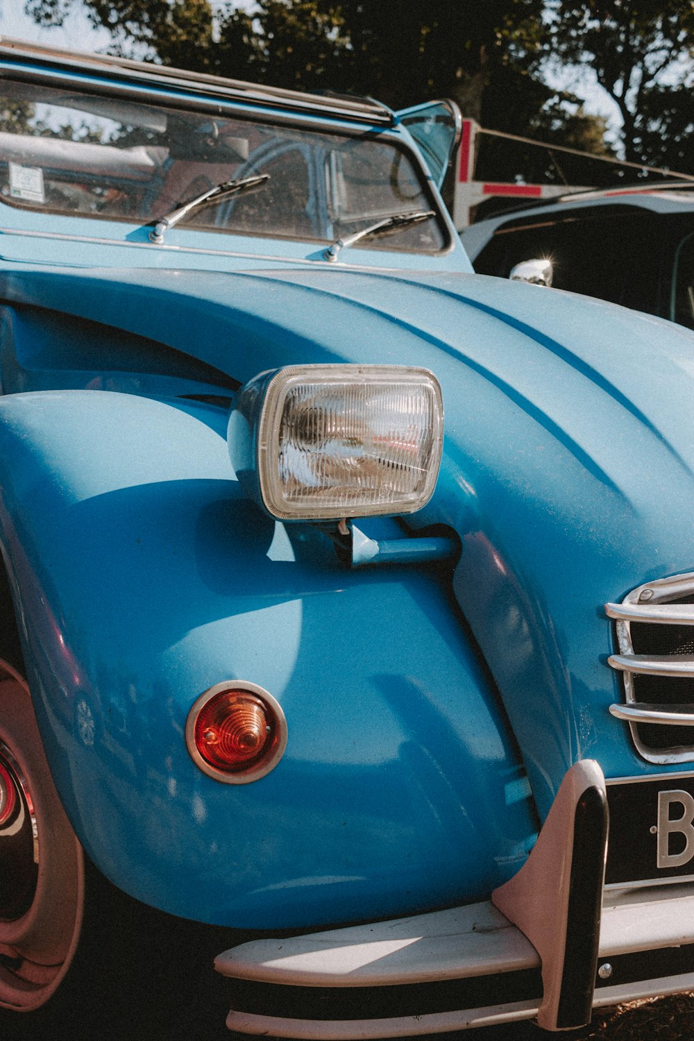 blue and silver vintage car