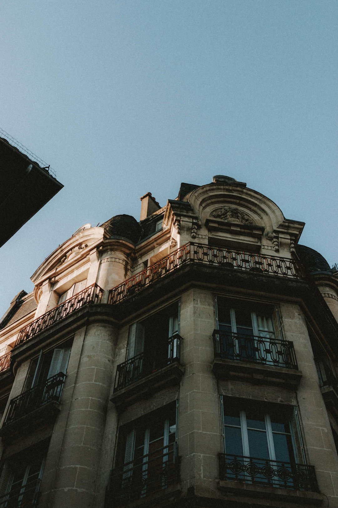 brown concrete building under blue sky during daytime