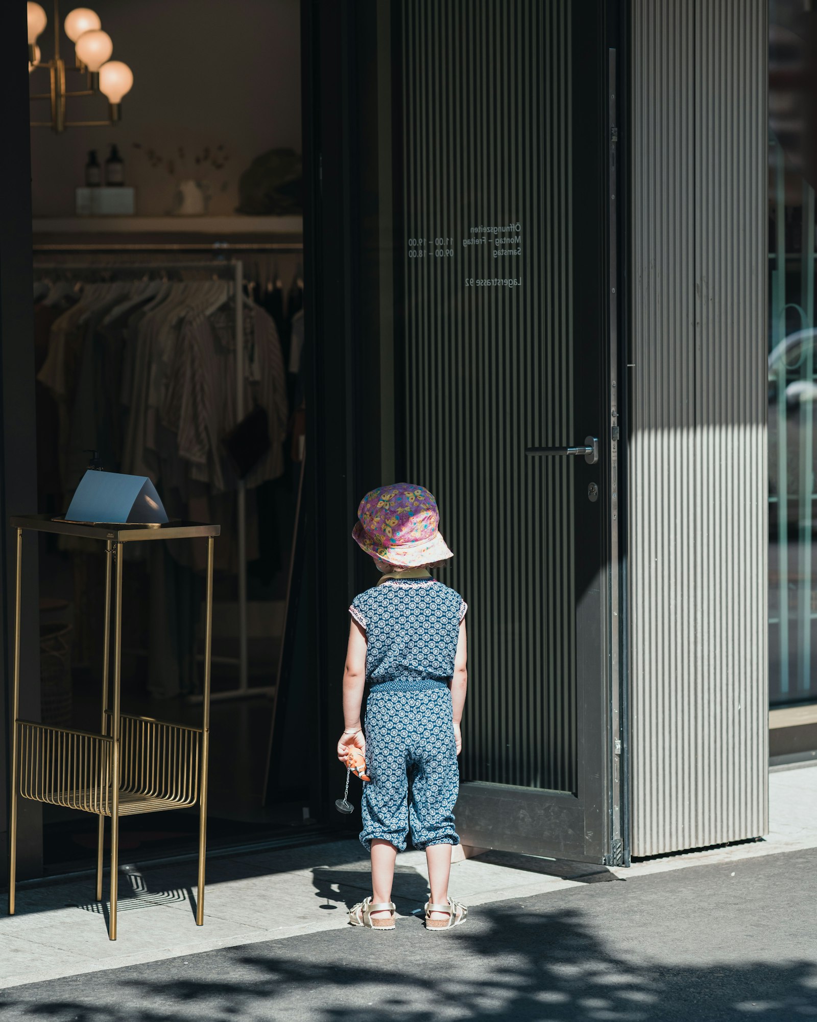 Sony FE 85mm F1.4 GM sample photo. Girl in blue and photography