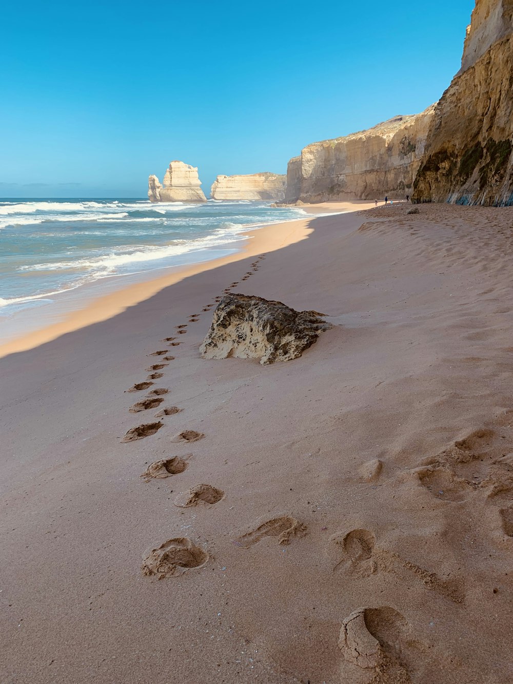 brown rock formation on seashore during daytime