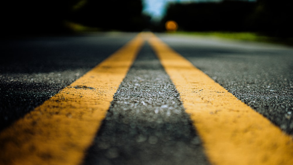 black and yellow concrete road