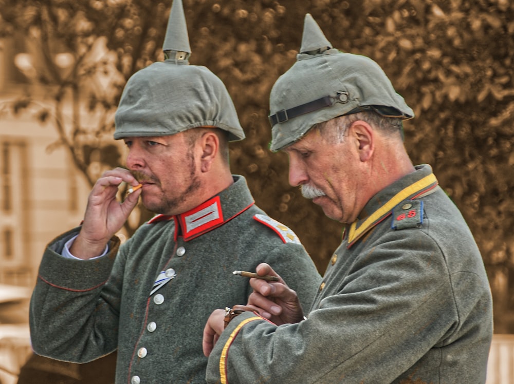 man in black and red uniform