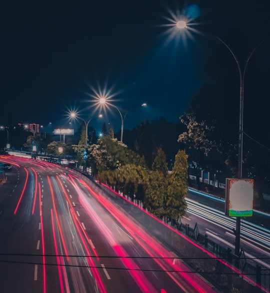 time lapse photography of cars on road during night time in Tangerang Indonesia