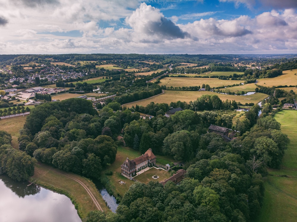 aerial view of green trees and houses during daytime