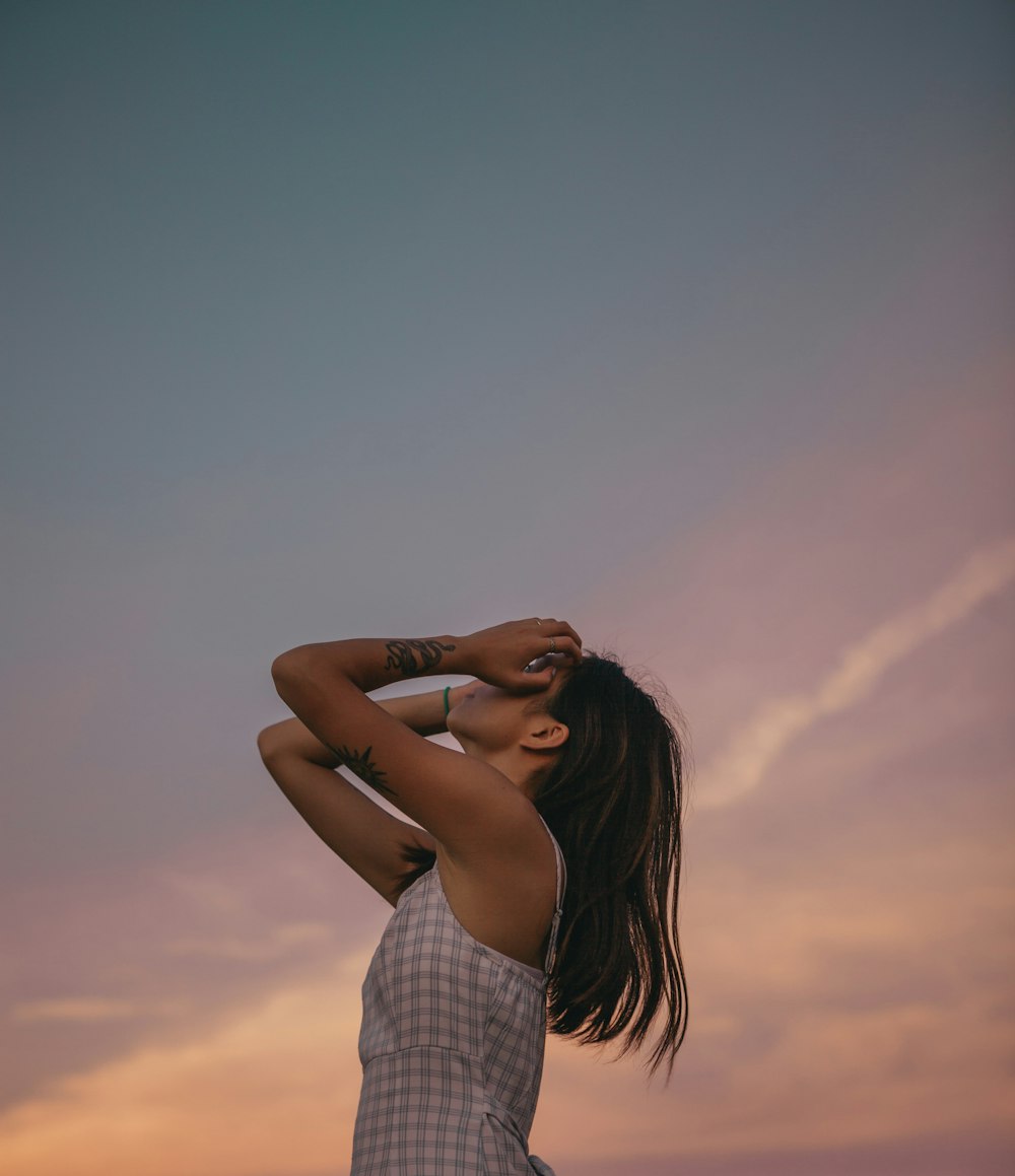 woman in white and black plaid dress shirt