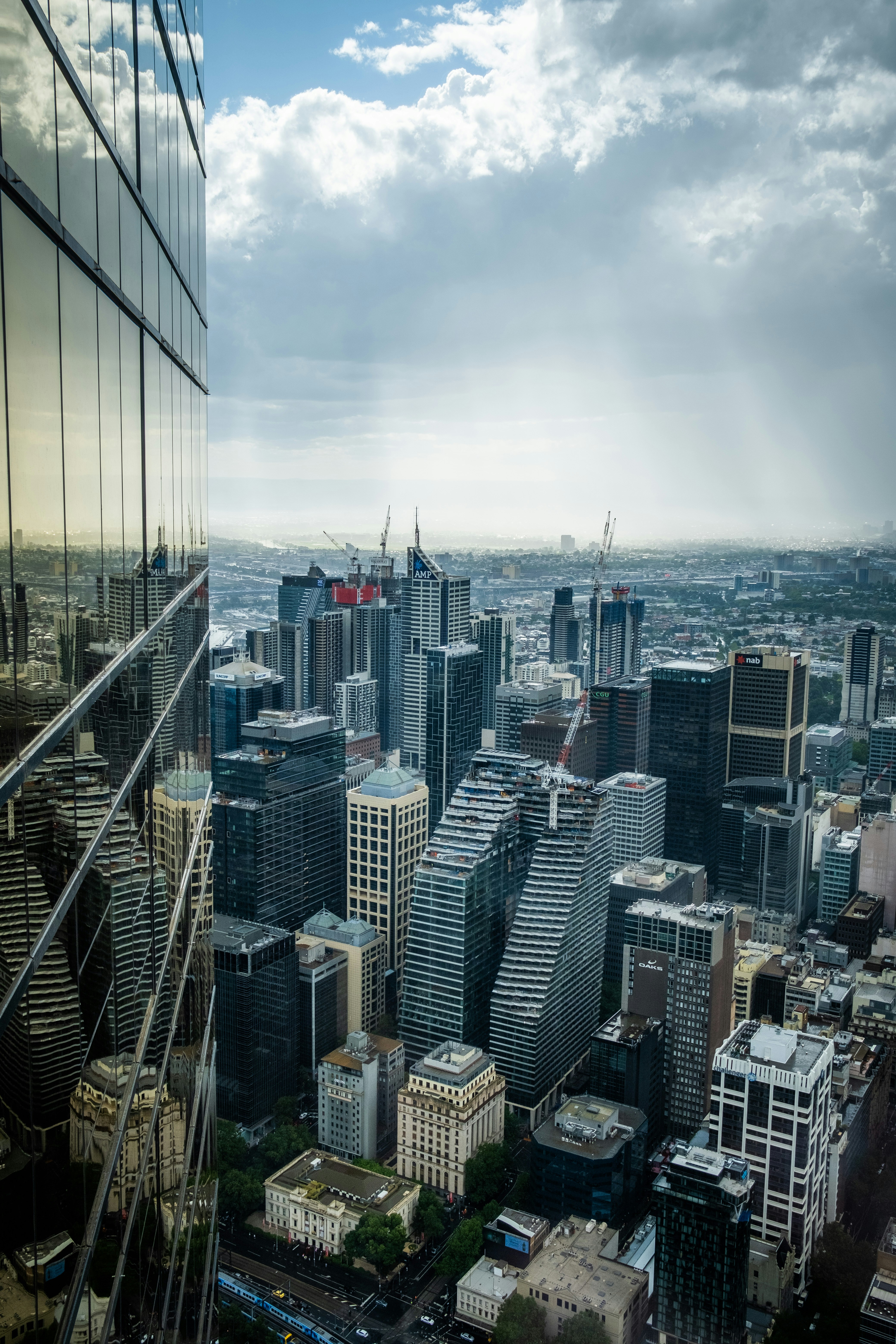 high rise buildings near body of water during daytime