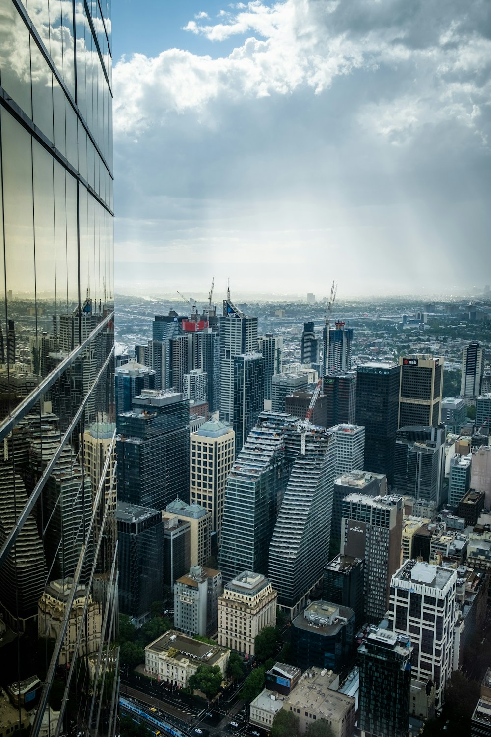 high rise buildings near body of water during daytime