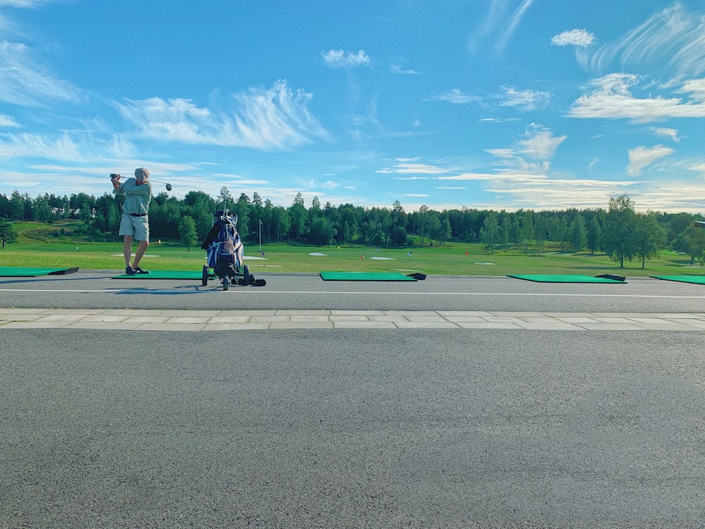 man in black jacket and black pants riding on motorcycle on road during daytime