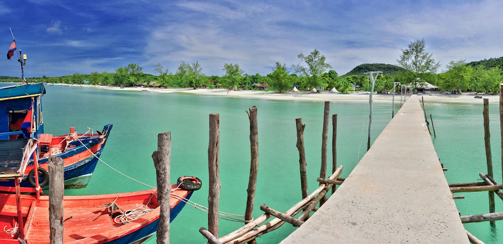 brown wooden dock on sea during daytime