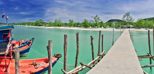 brown wooden dock on sea during daytime in Koh Rong Sanloem Cambodia