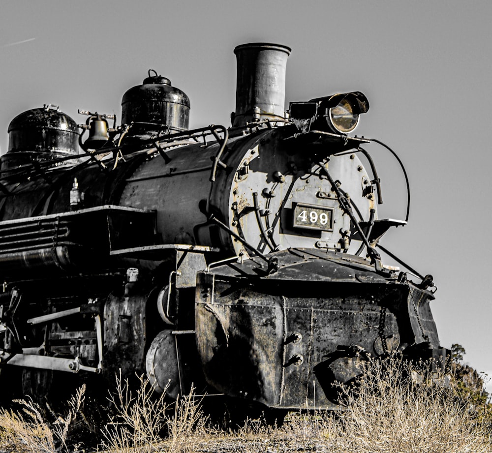 black and gray train on rail tracks