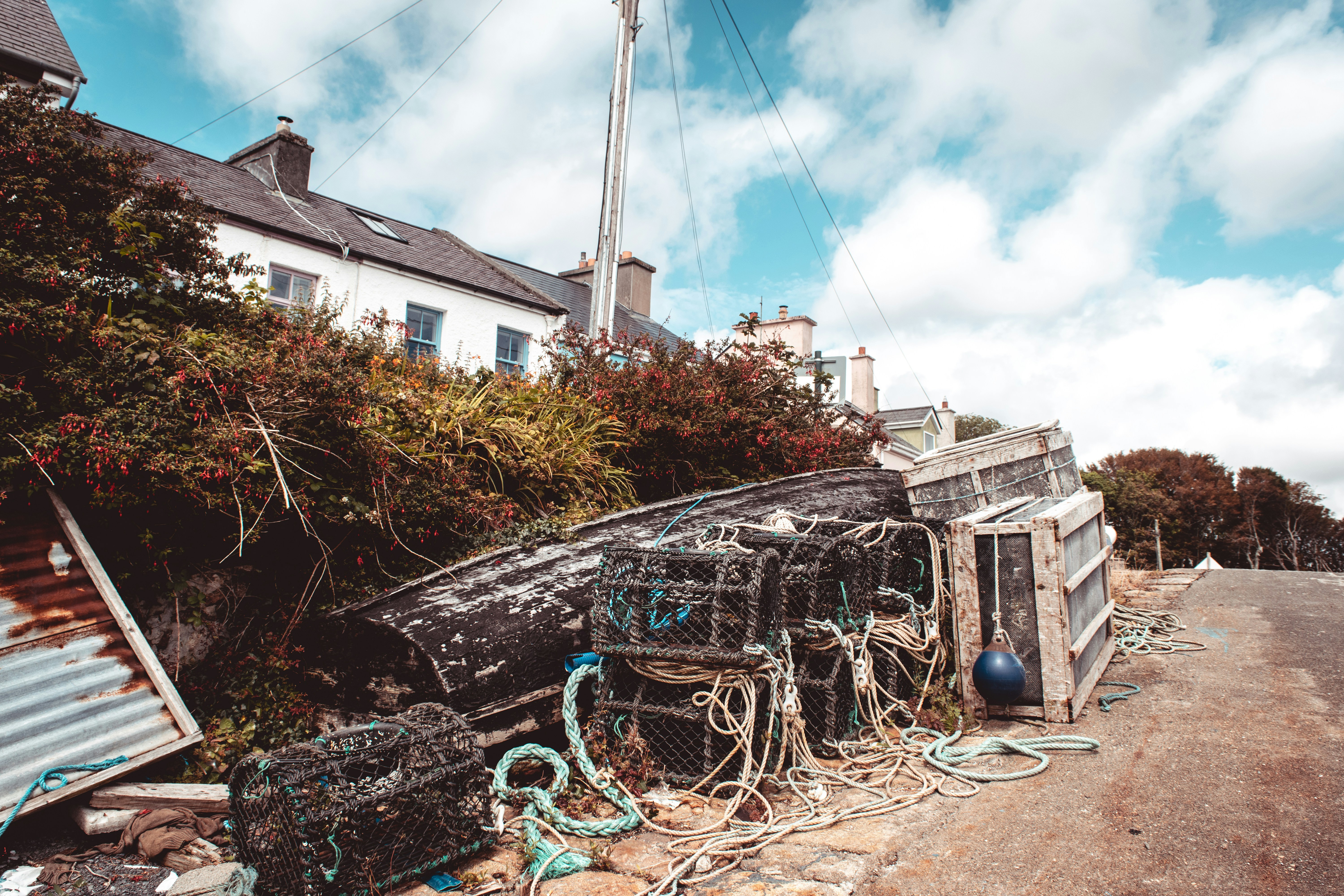 blue bicycle on brown soil near white concrete building during daytime celtic teams background