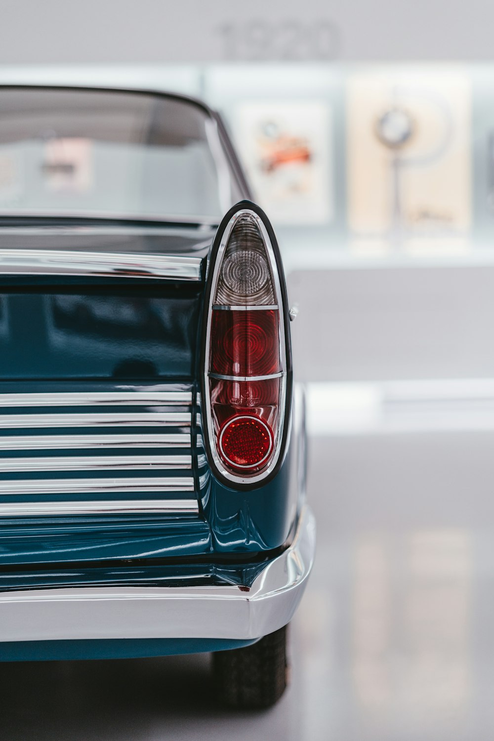 blue and silver car in tilt shift lens