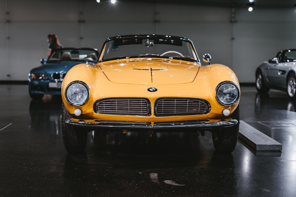 yellow car parked on parking lot