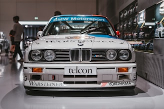 white bmw m 3 on road