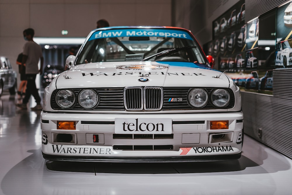 white bmw m 3 on road