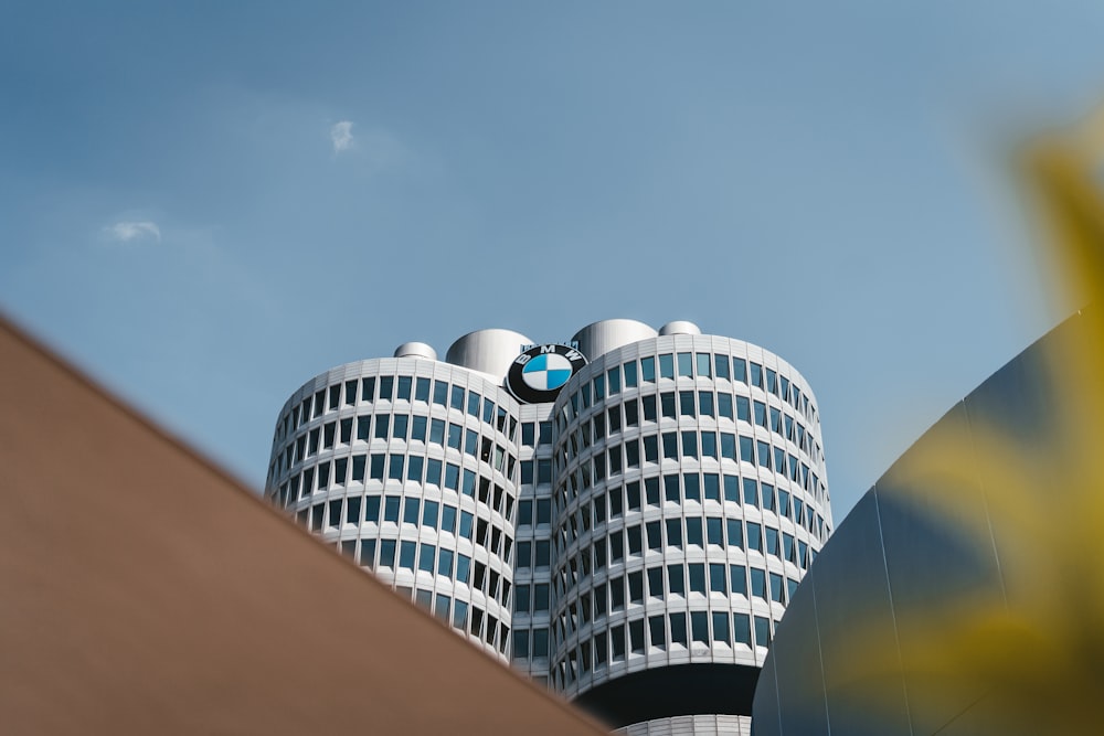 white and black concrete building under blue sky during daytime