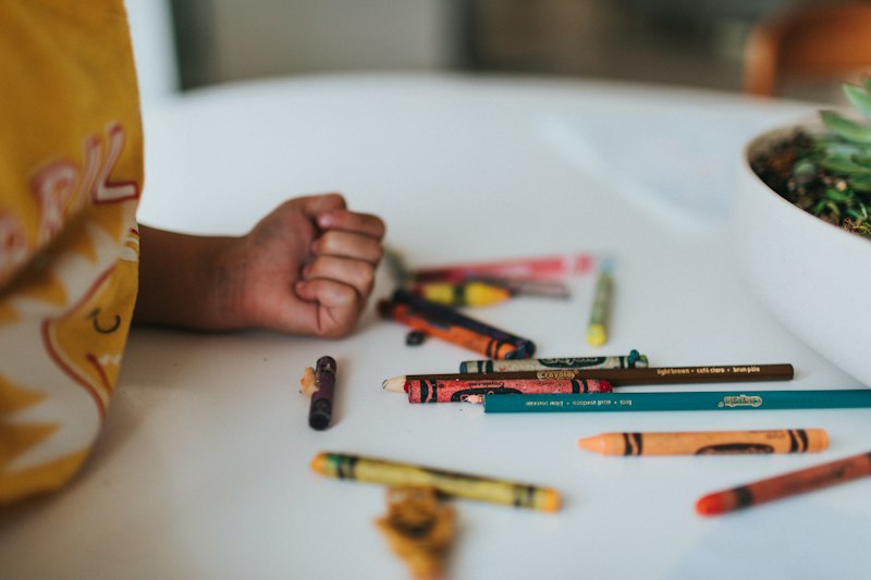 Coloring pencils on a clean white table