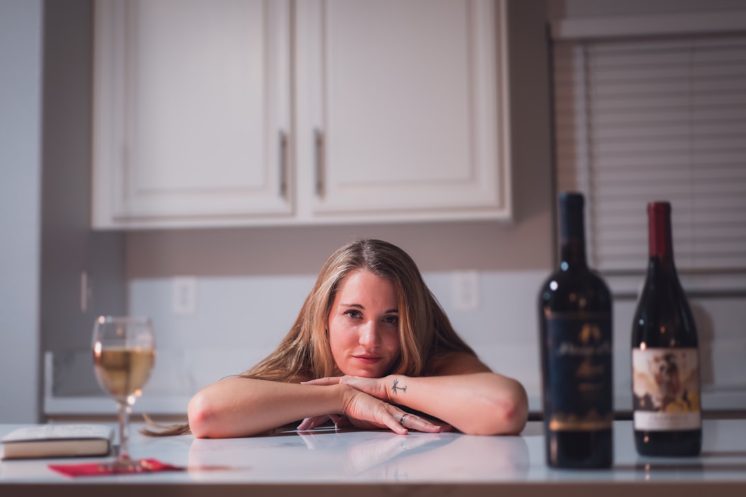 woman lying on white table