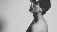 black and white image of male body promoting plastic surgery in Vietnam