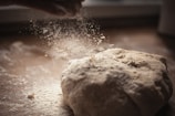 A close-up of flour and dough, highlighting the baking process.