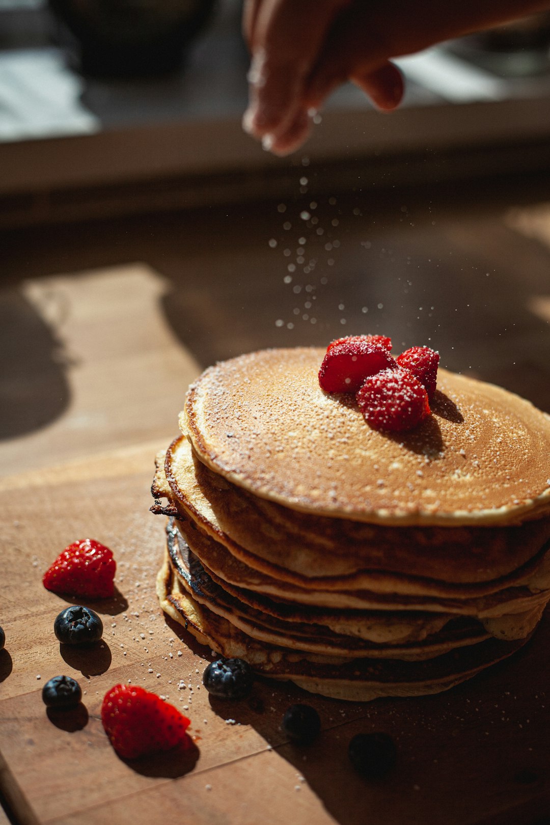 brown cake with strawberry on top