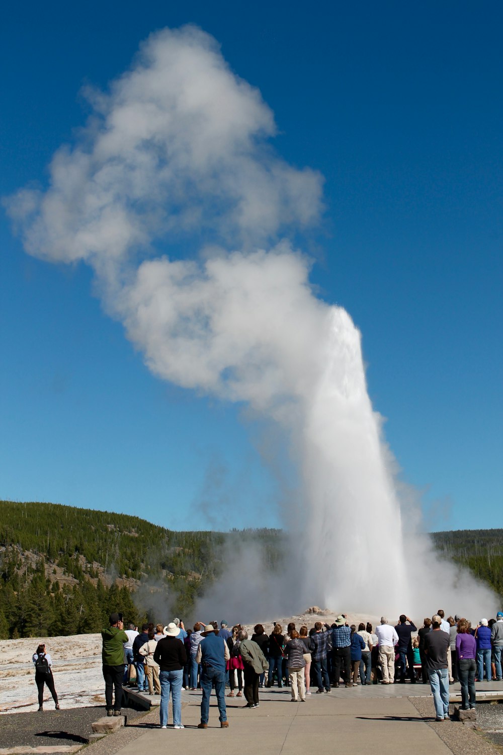 white smoke coming out from blue sky