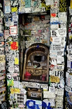 A collection of vibrant ATM screen images displayed on a digital wall.