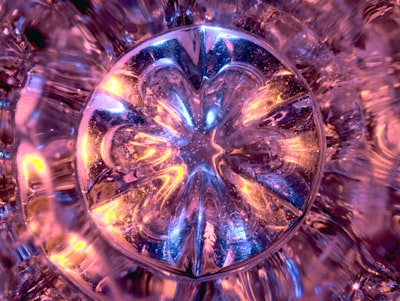 close up photo of clear glass star ornament mystical teams background