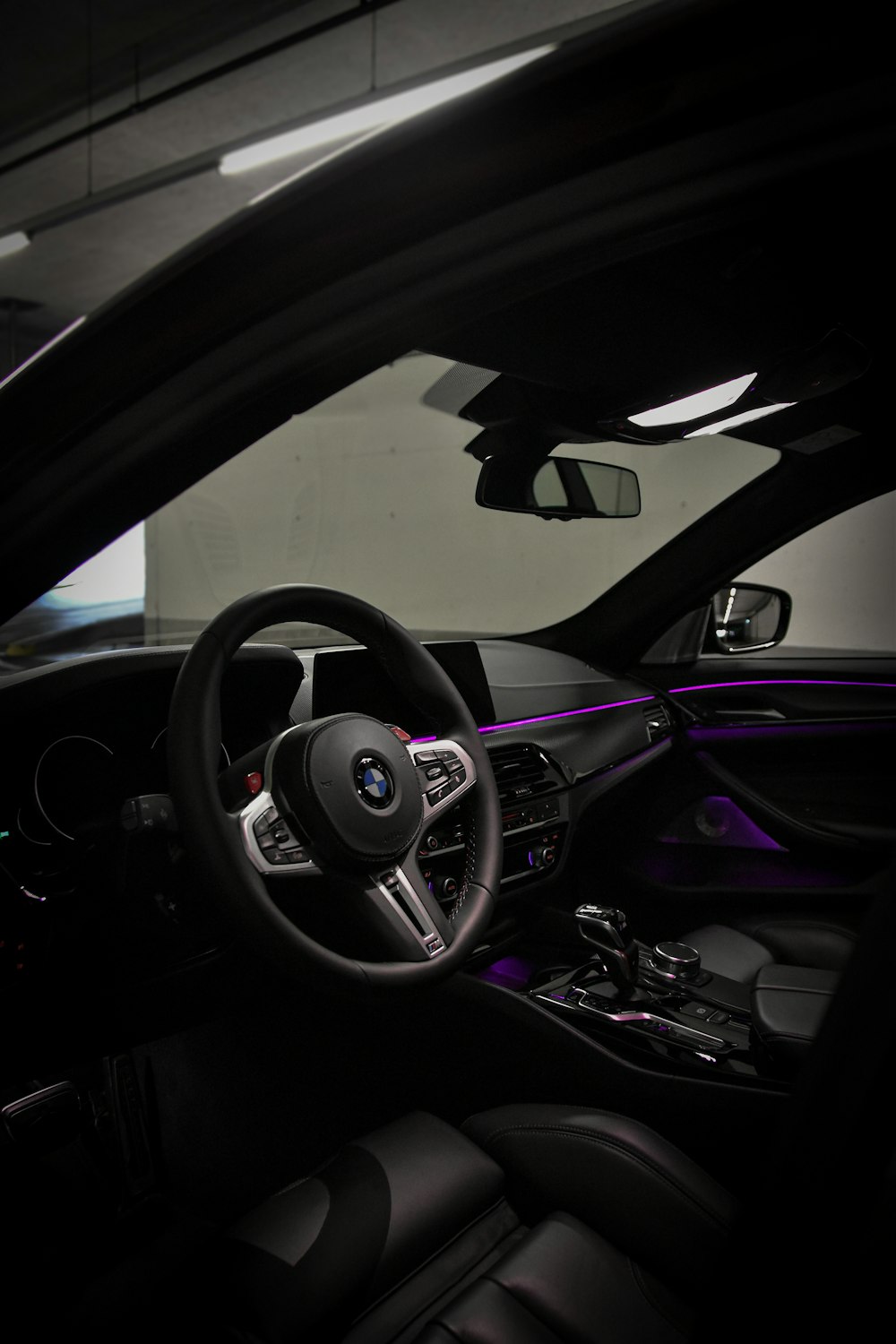 black and purple bmw steering wheel