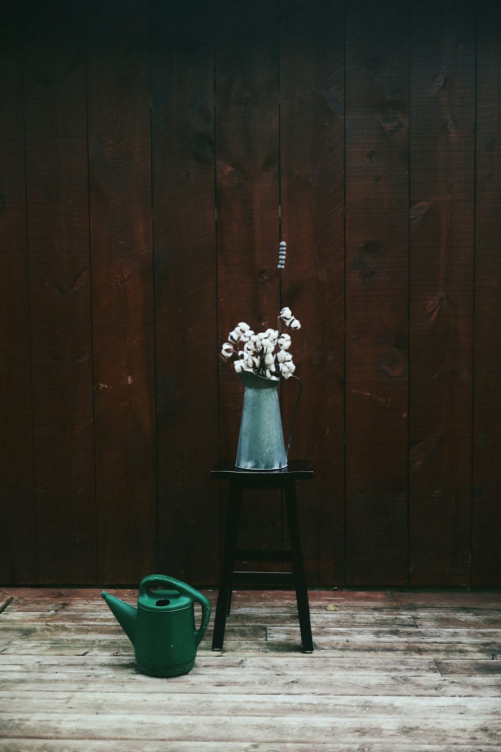 white flowers on green plastic seat