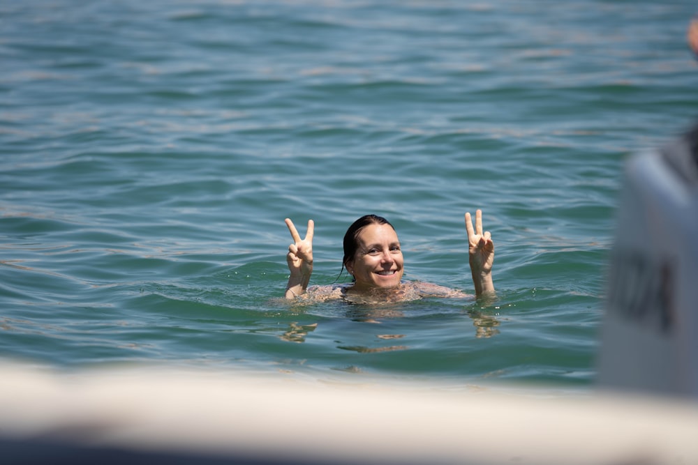 girl in water during daytime