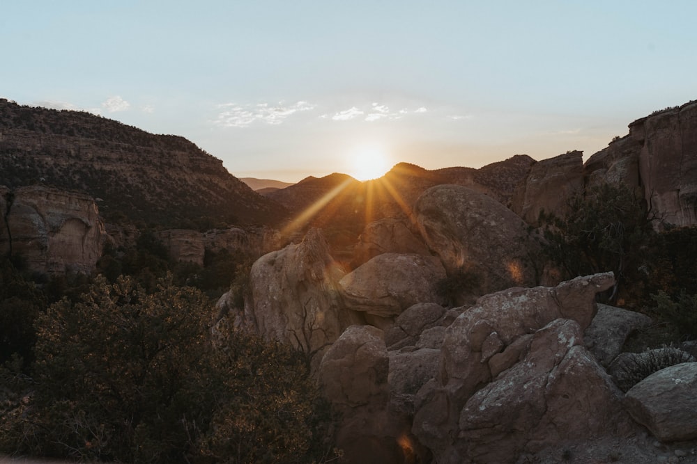 brown rocky mountain during sunset